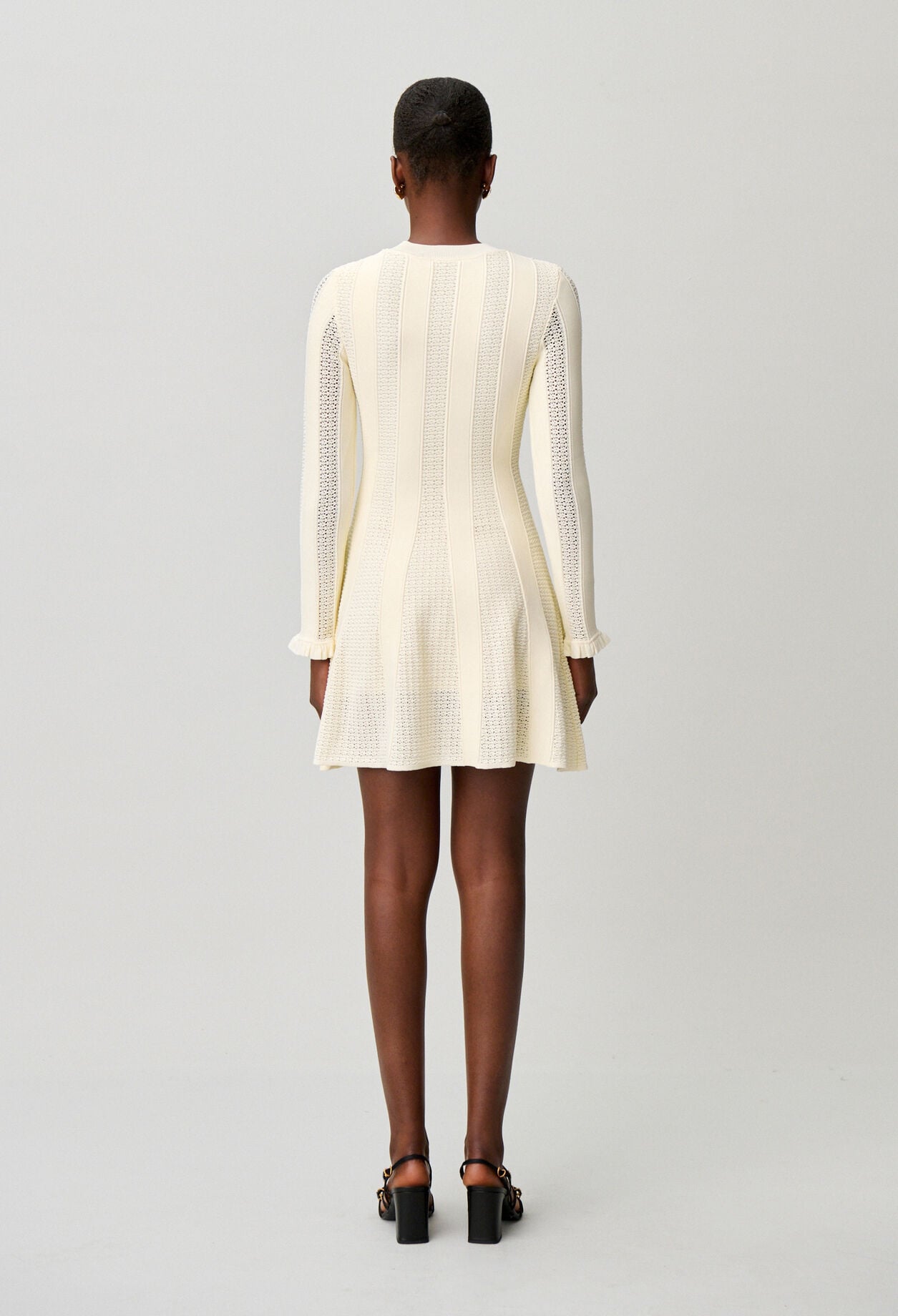 Robe courte maille patineuse