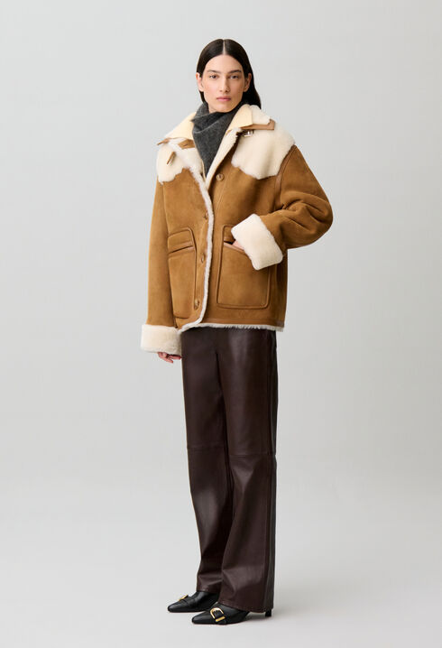 Veste peau lain&eacute;e col cuir