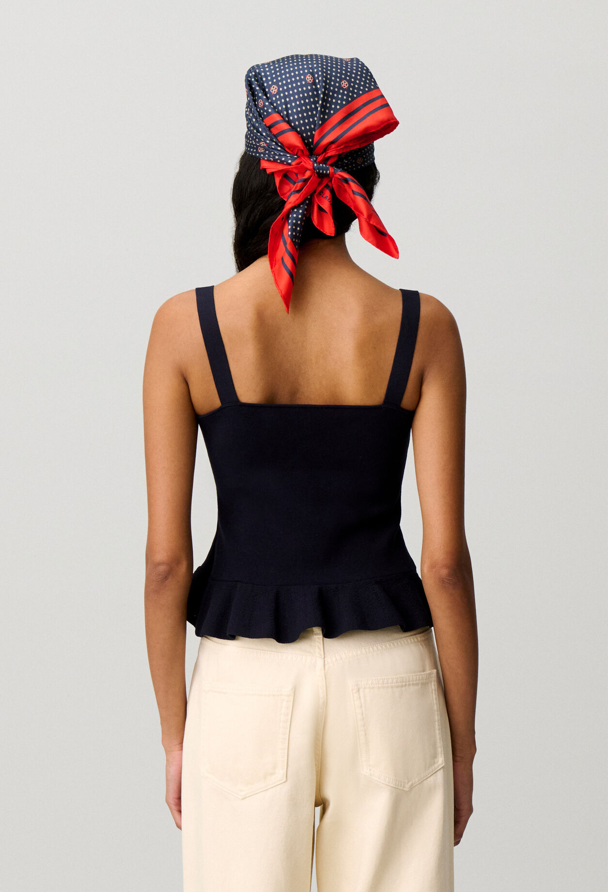 Top maille volant