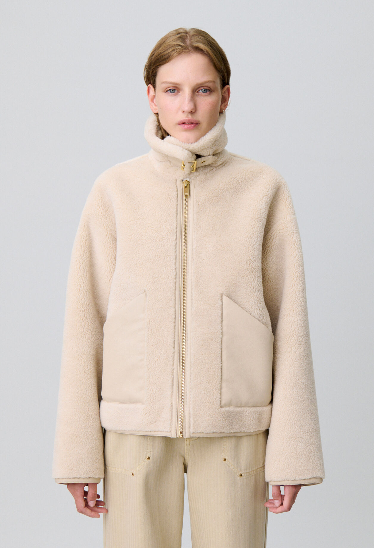 Manteau effet peau lainée