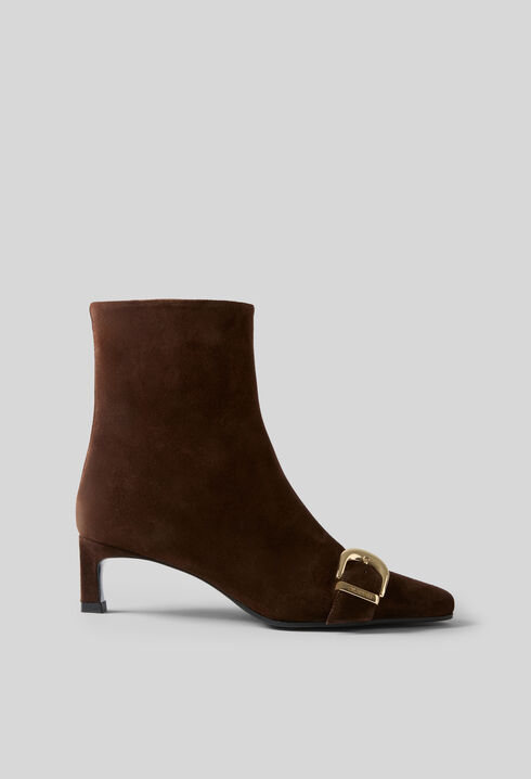 Bottines su&egrave;de boucle dor&eacute;e