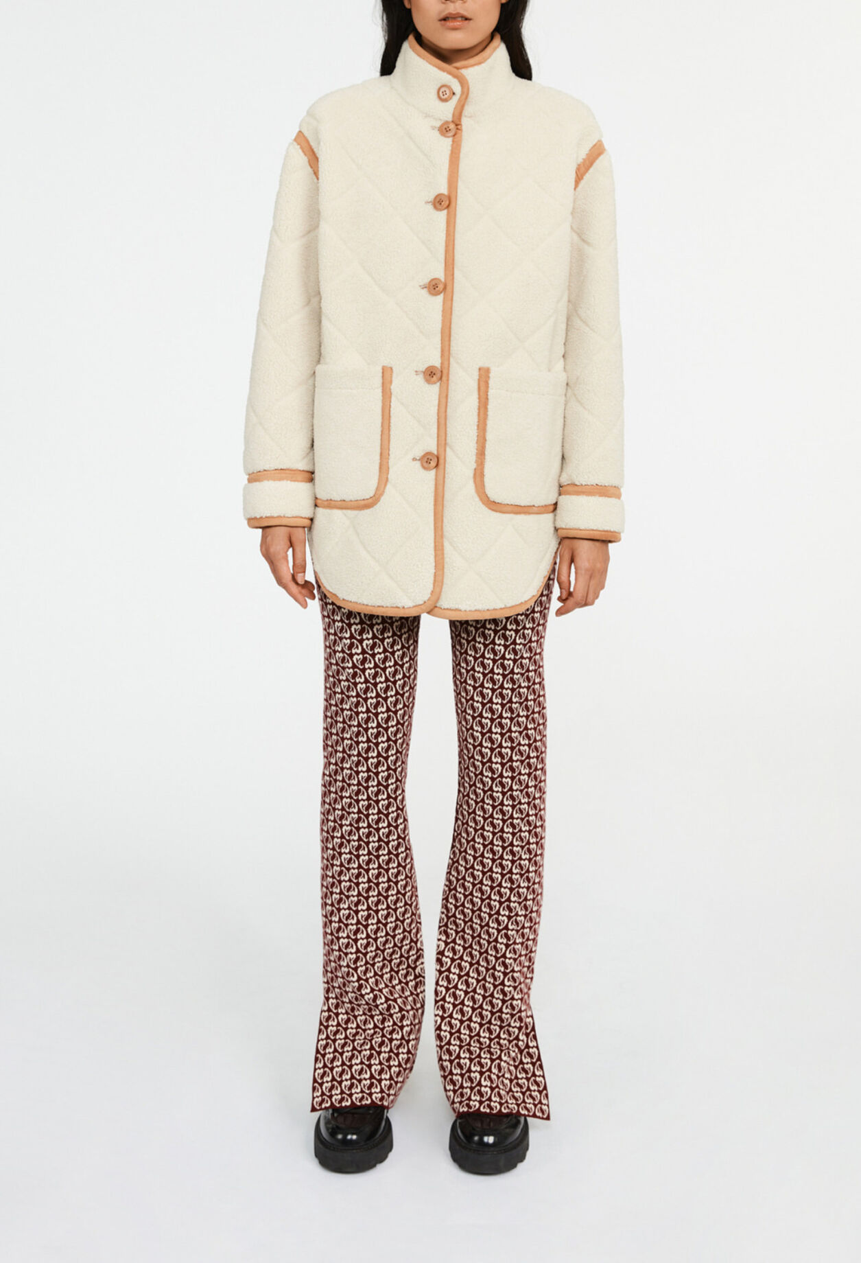Manteau effet peau lainée
