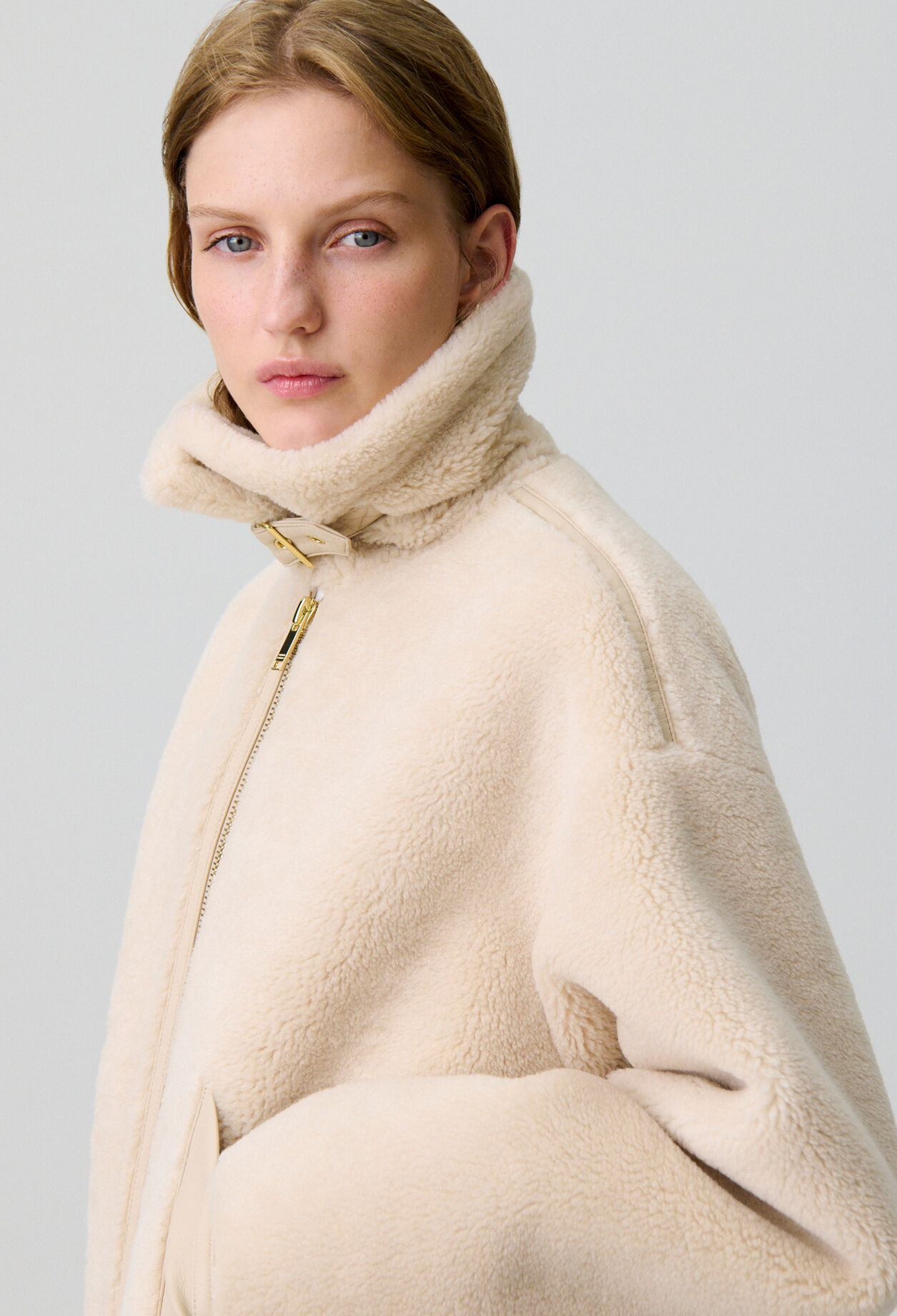Manteau effet peau lainée
