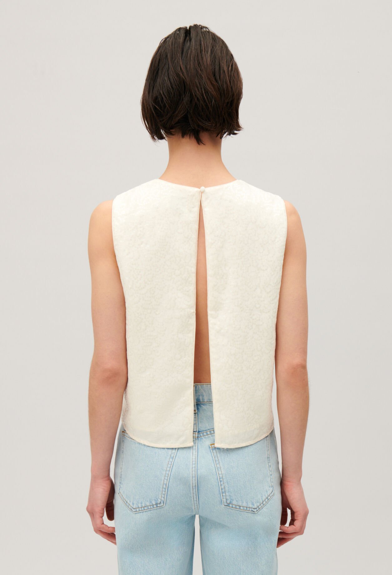 Top sans manches paillettes écru