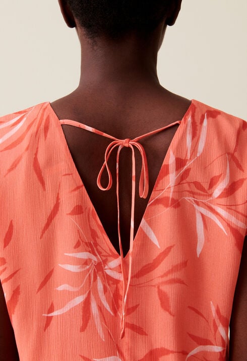Top dos nu à motif floral