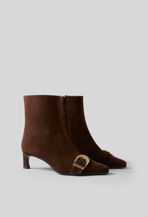 Bottines su&egrave;de boucle dor&eacute;e