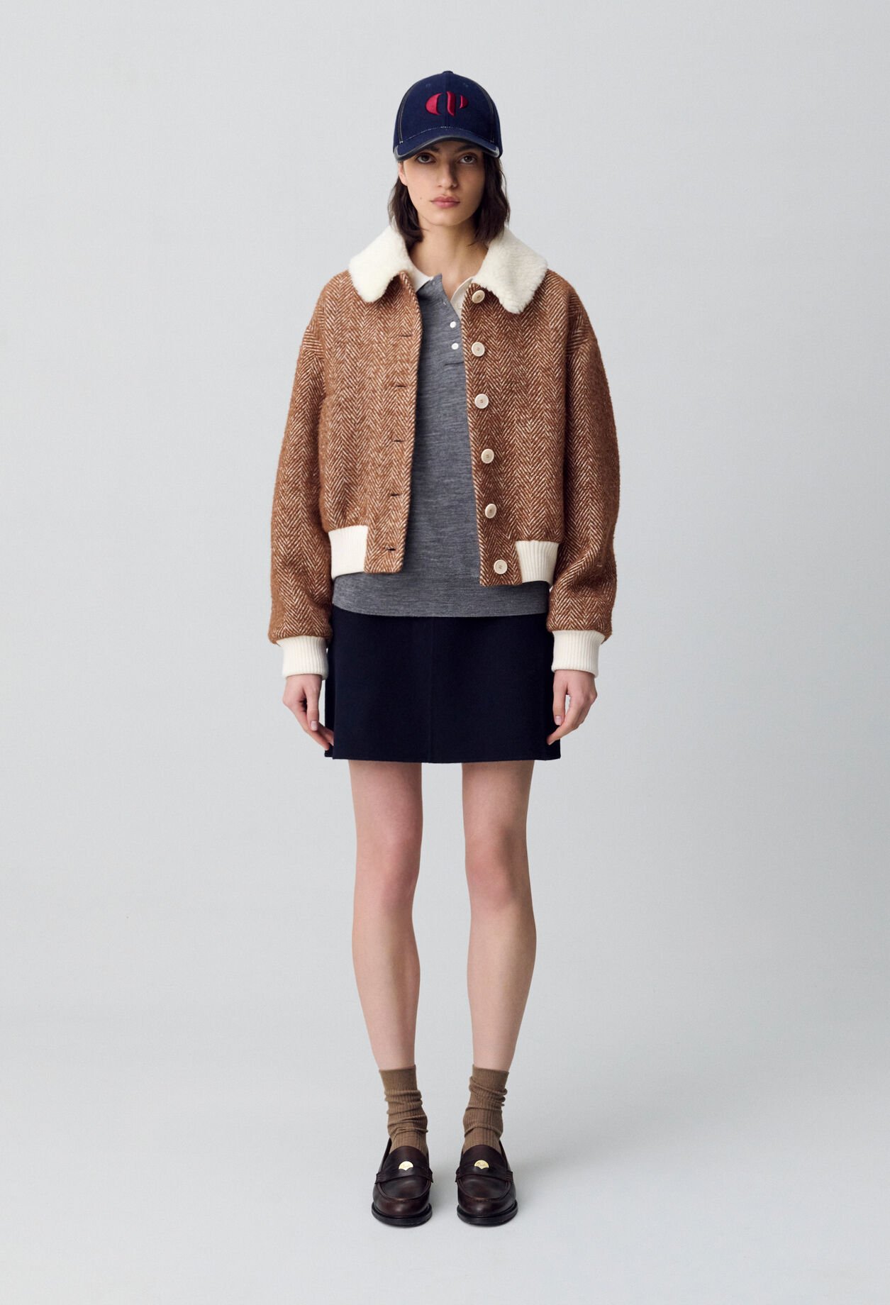 Manteau court col fausse fourrure