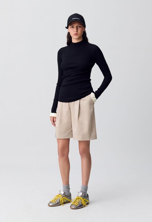 Pull près du corps