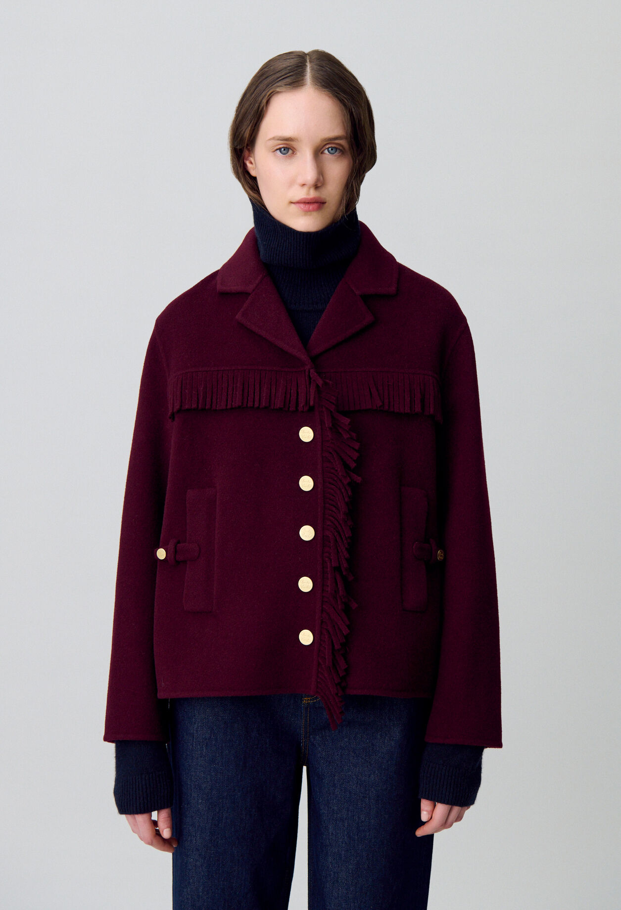 Manteau court laine franges