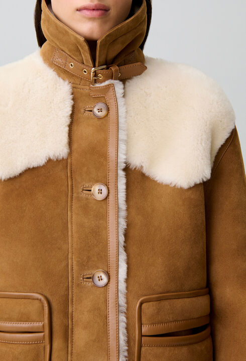 Veste peau lain&eacute;e col cuir