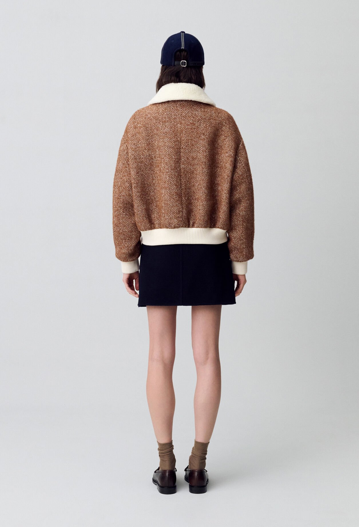 Manteau court col fausse fourrure