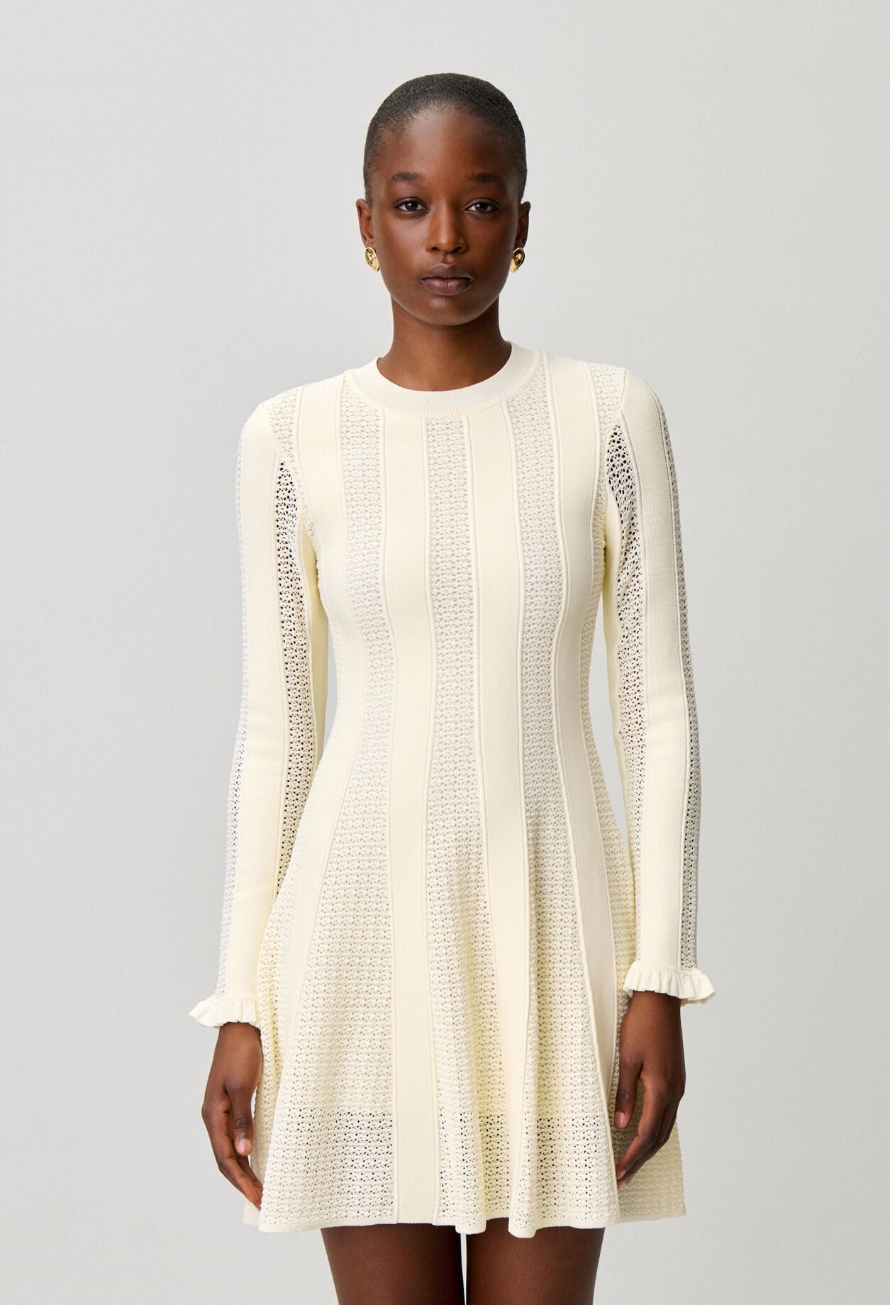 Robe courte maille patineuse