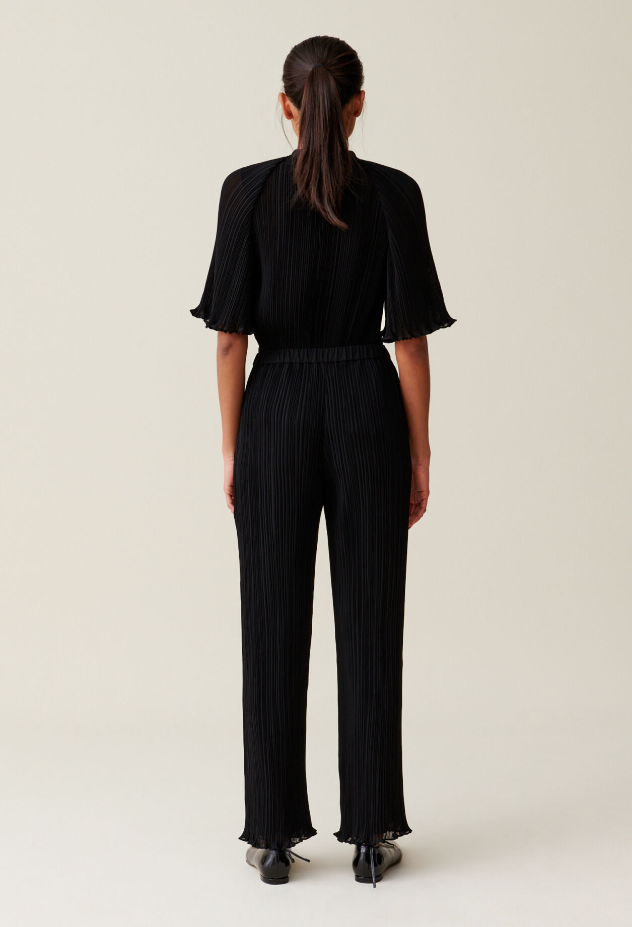 Pantalon fluide plissé volanté