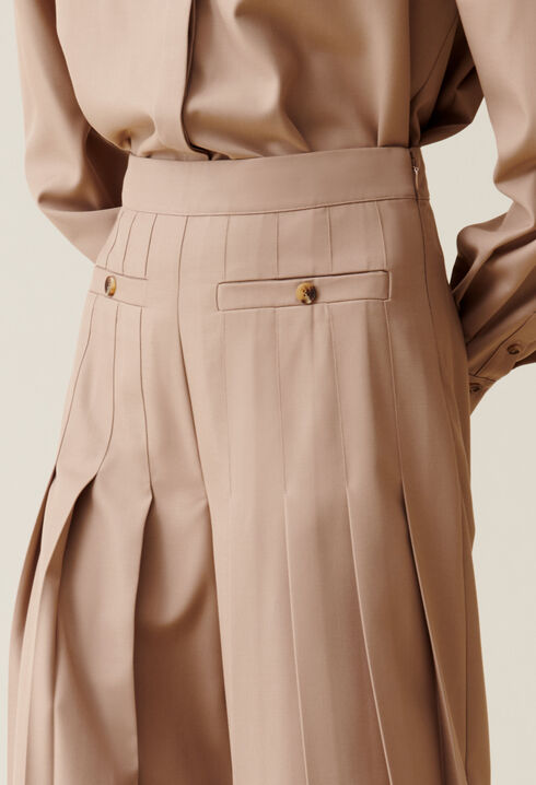 Pantalon plissé taille haute évasé