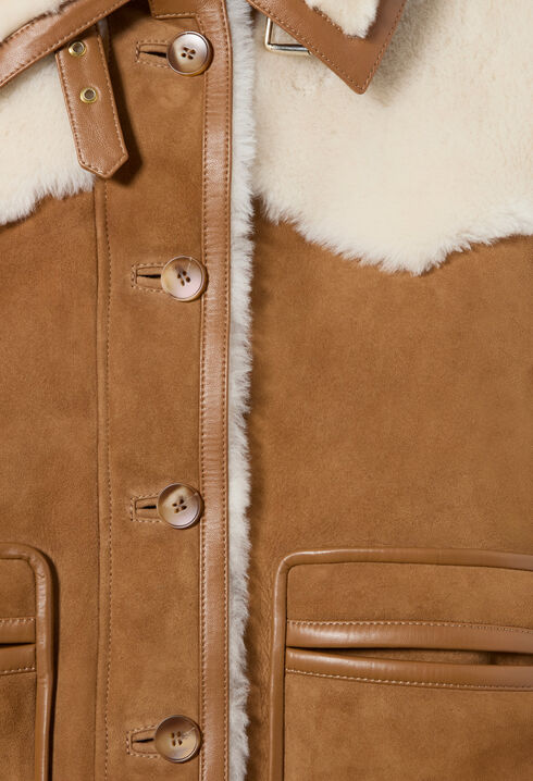 Veste peau lain&eacute;e col cuir