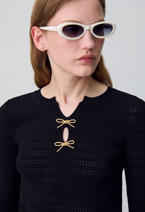 Pull maille fine noeuds
