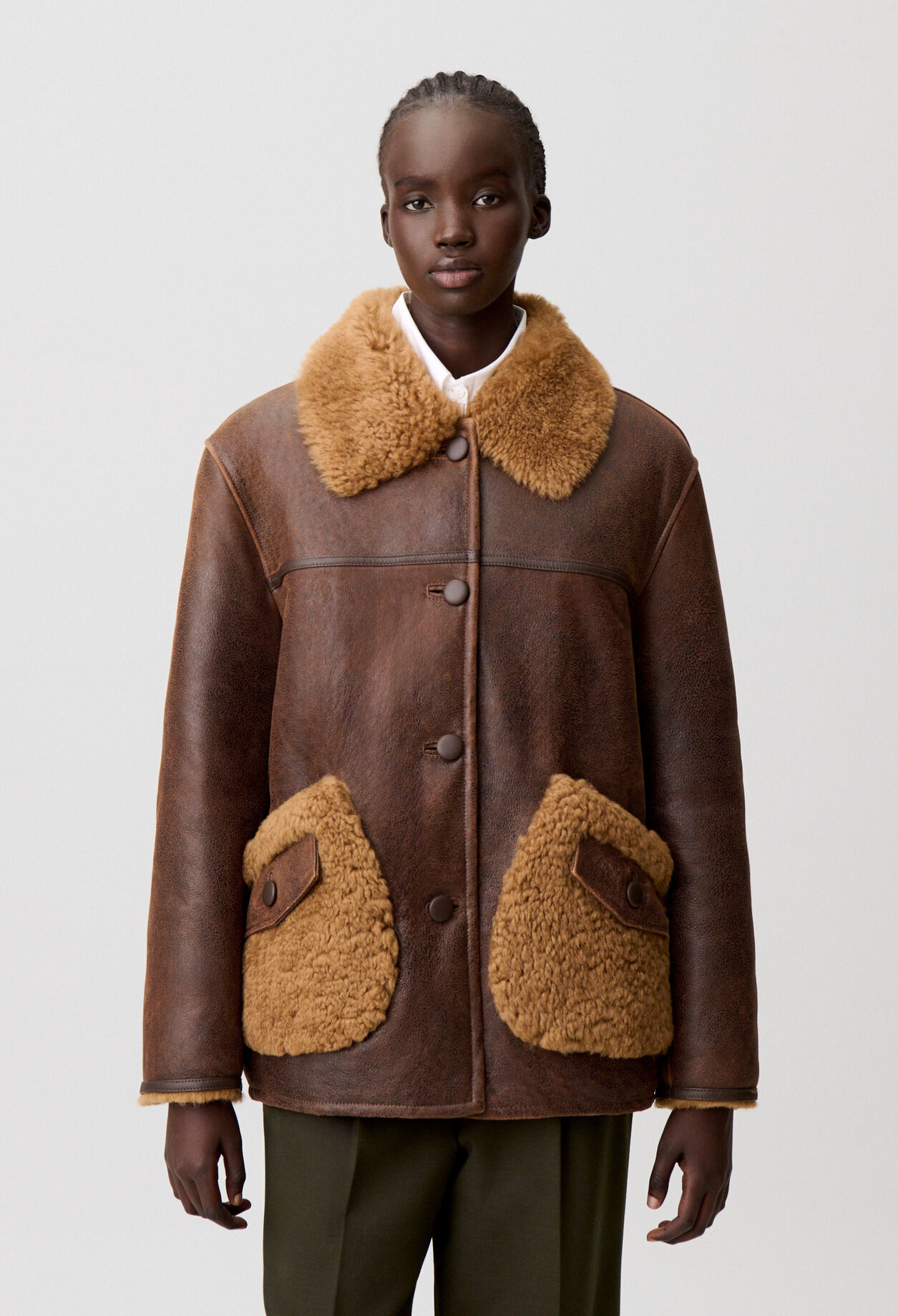 Manteau peau lain&eacute;e