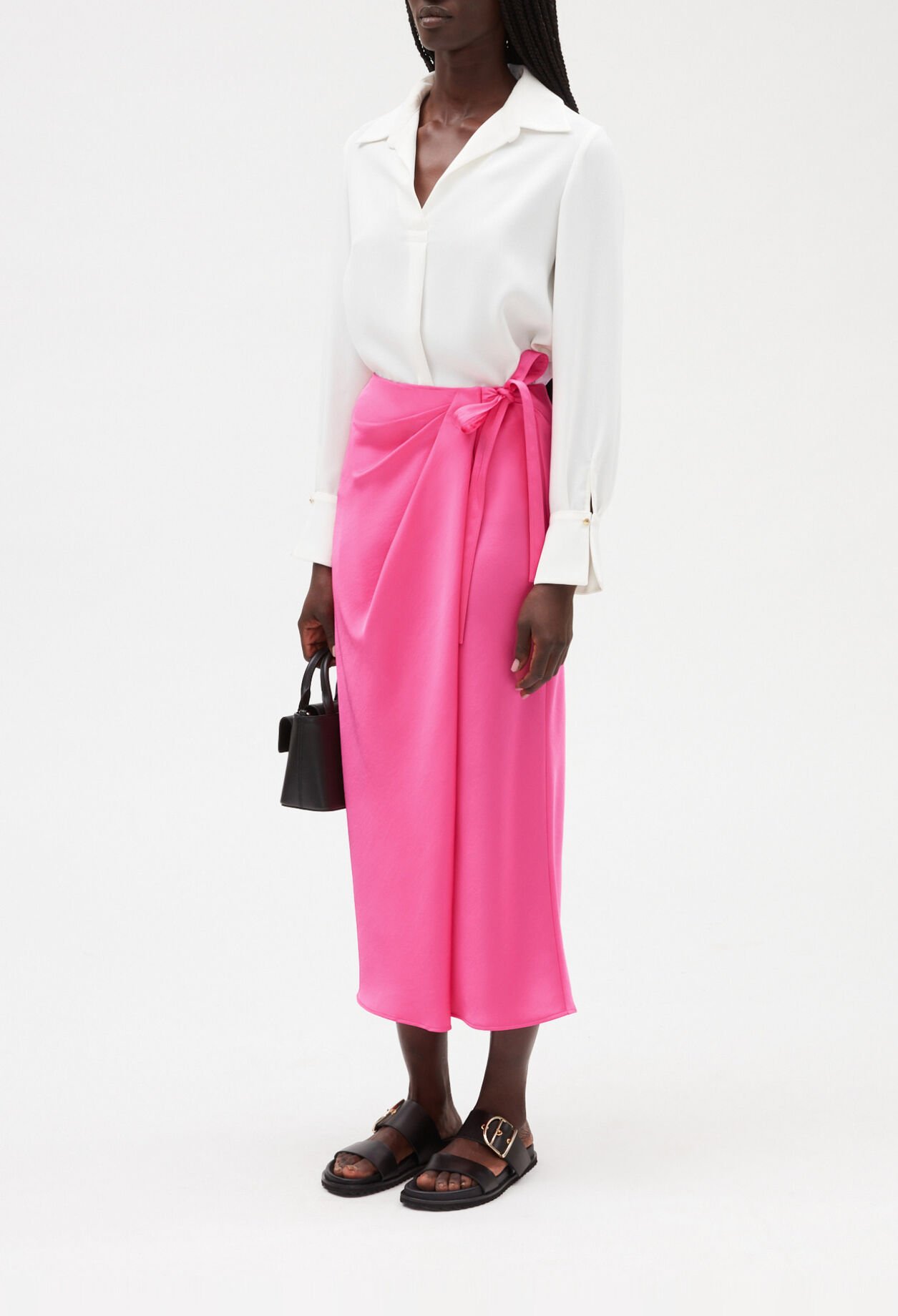 Jupe mi-longue nouée rose