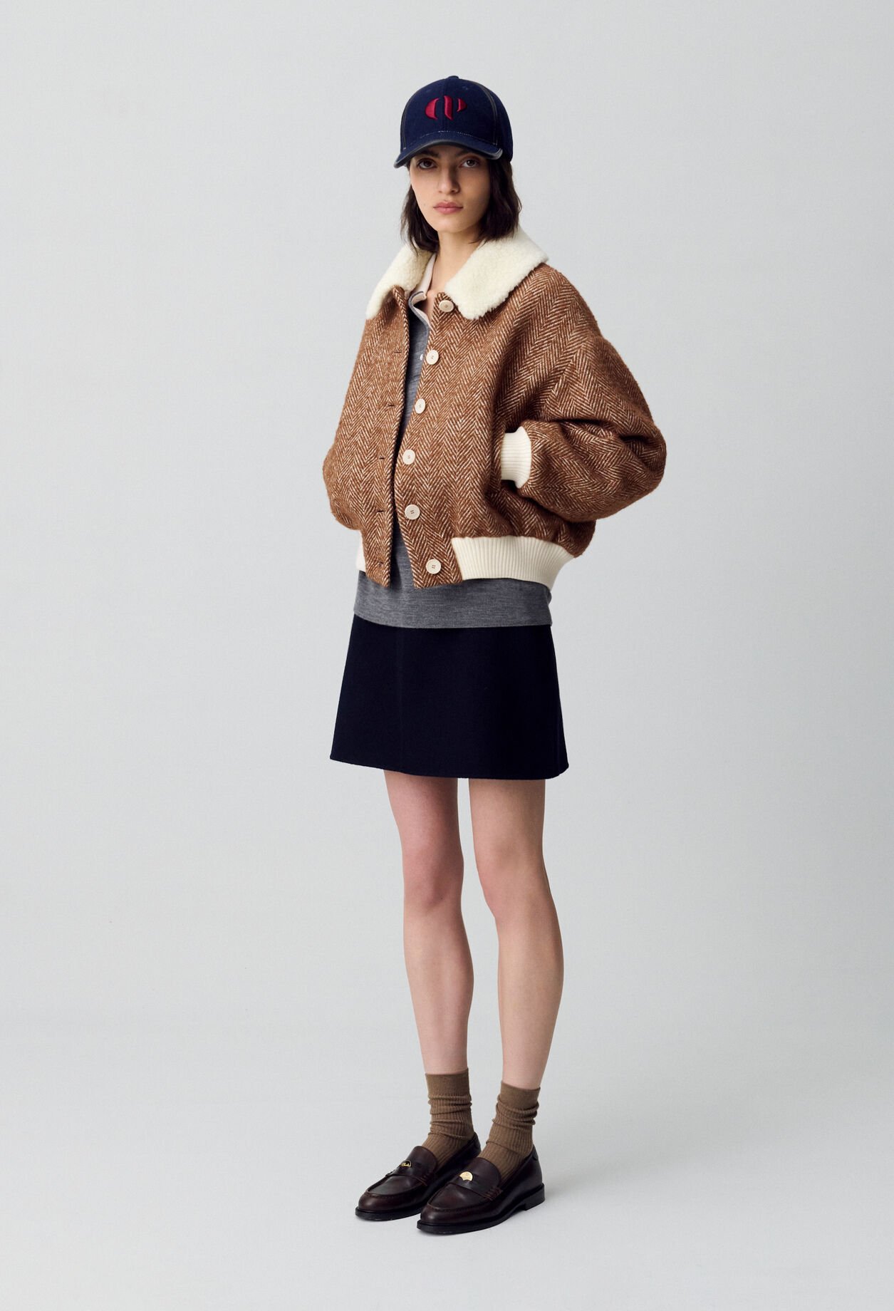 Manteau court col fausse fourrure