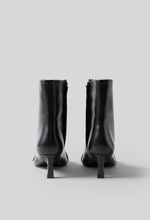 Bottines cuir boucle dor&eacute;e