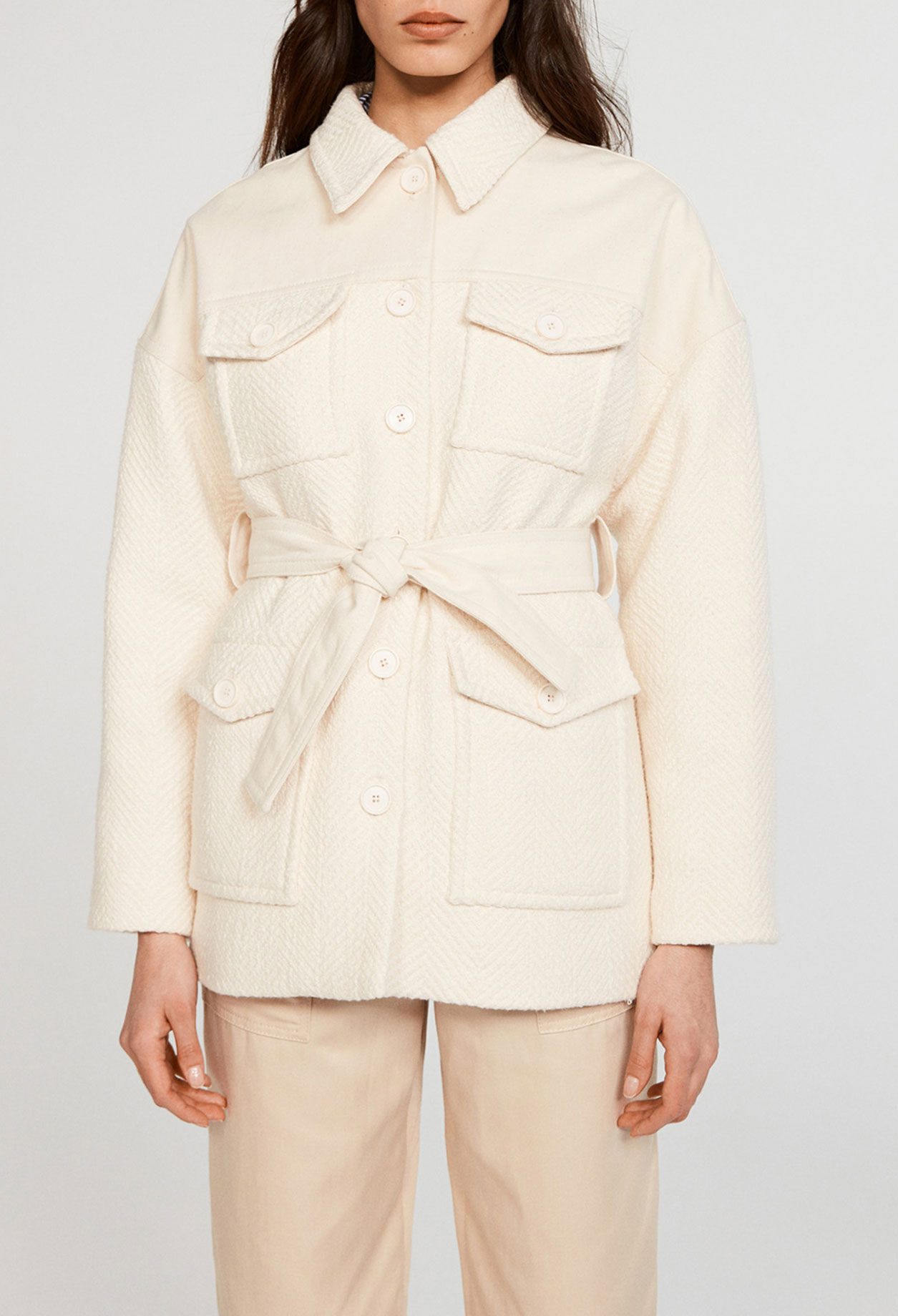 Veste en maille ceinturée