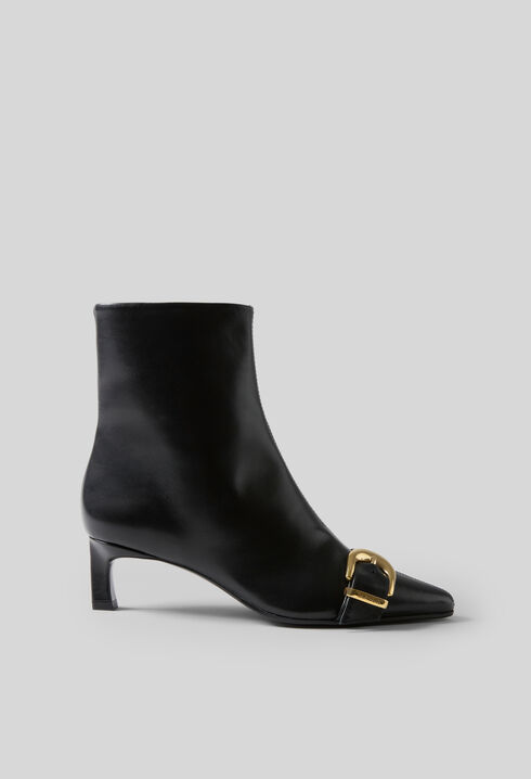 Bottines cuir boucle dor&eacute;e