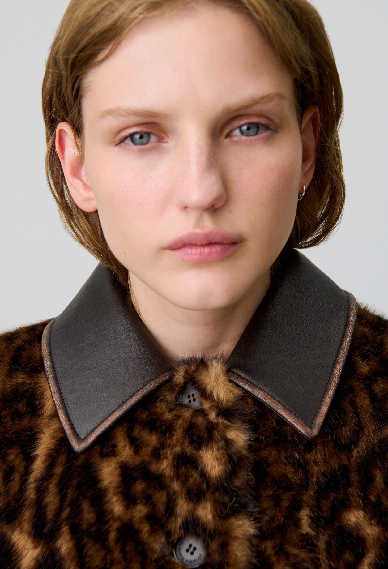 Manteau fausse fourrure léopard