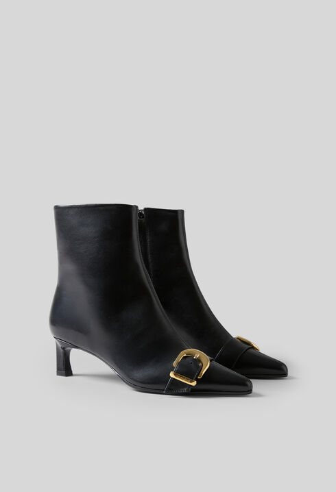 Bottines cuir boucle dor&eacute;e