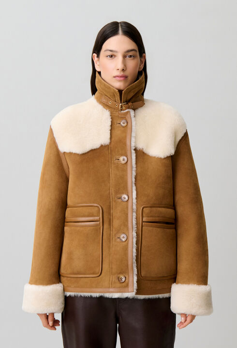 Veste peau lain&eacute;e col cuir