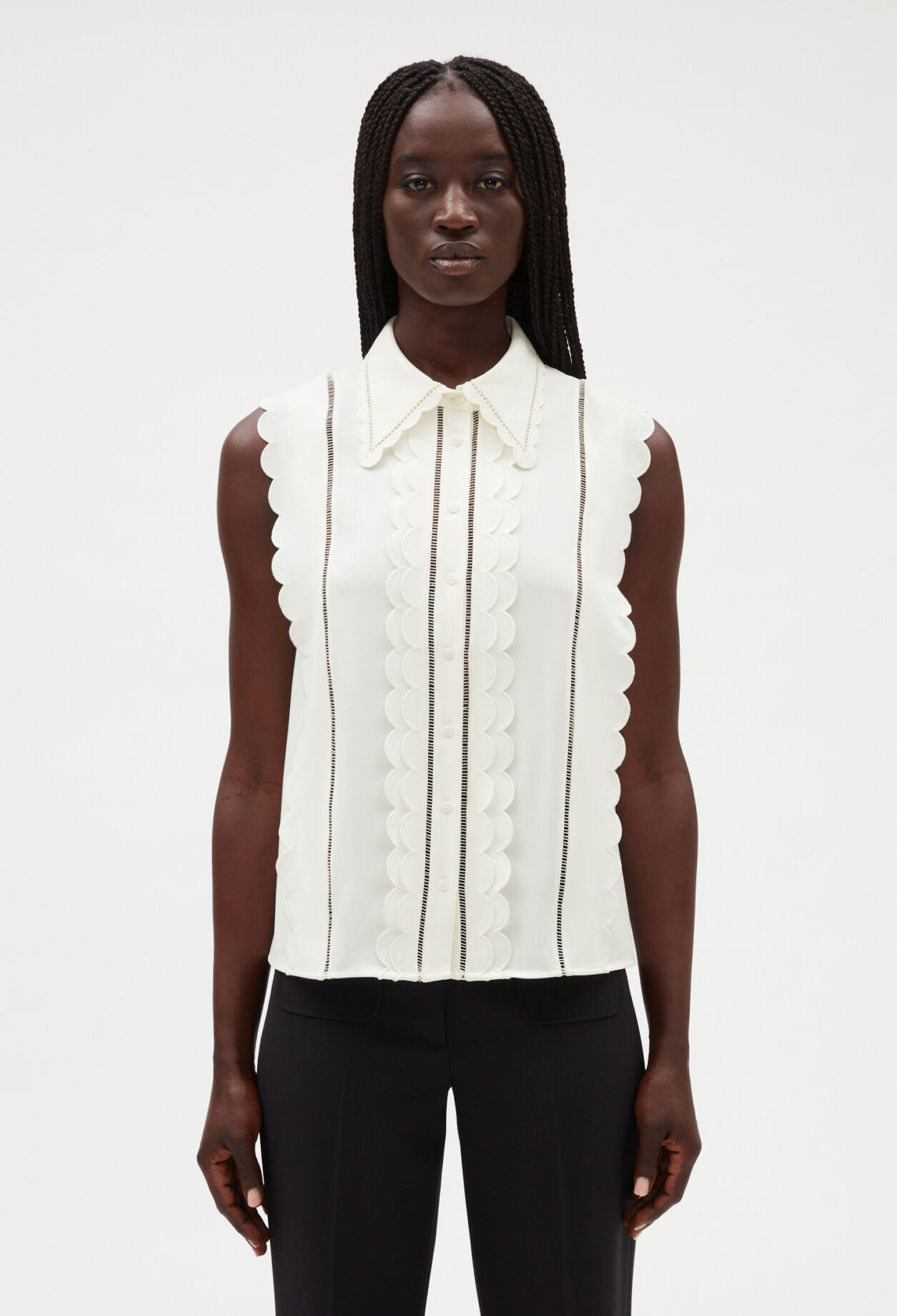 Chemise festonnée sans manches