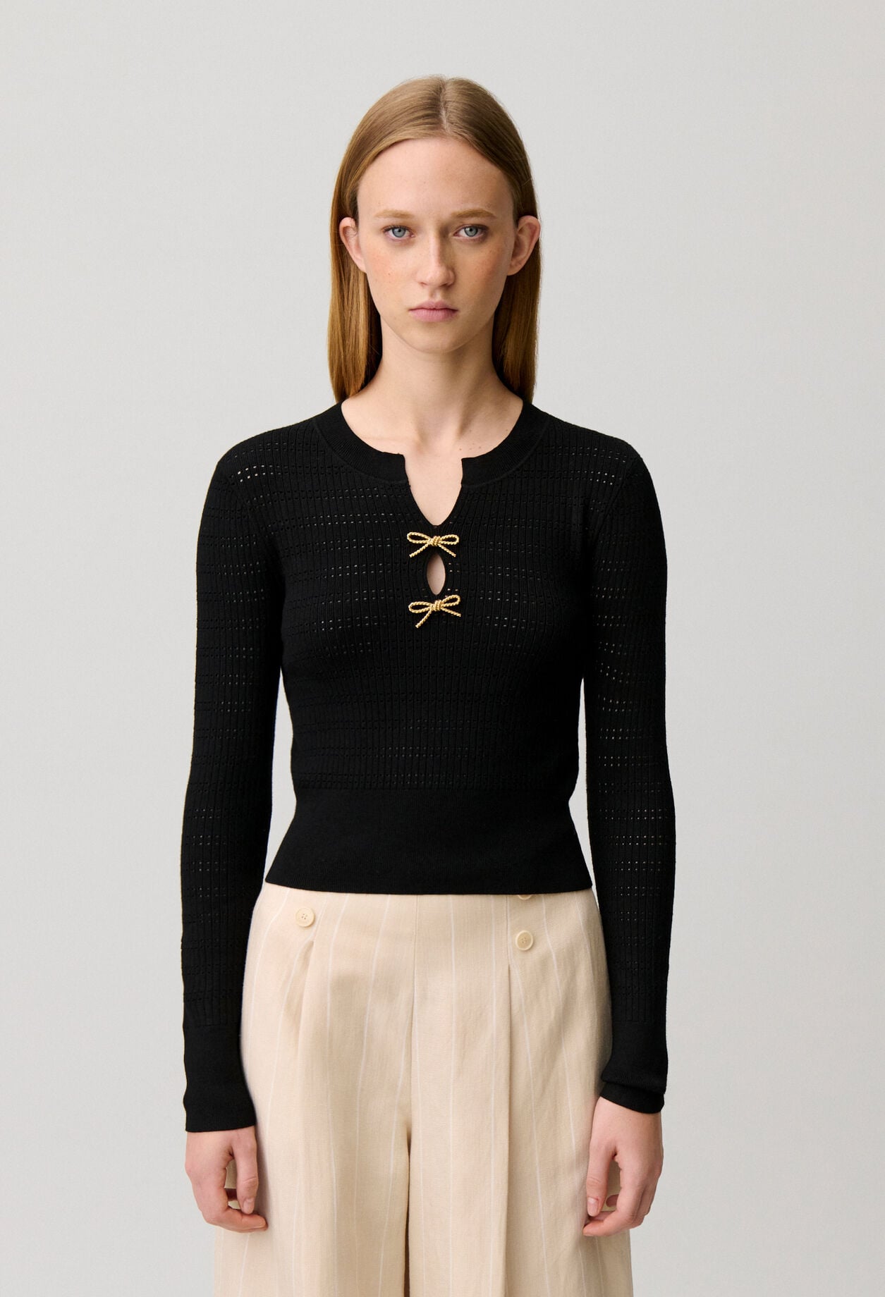 Pull maille fine noeuds