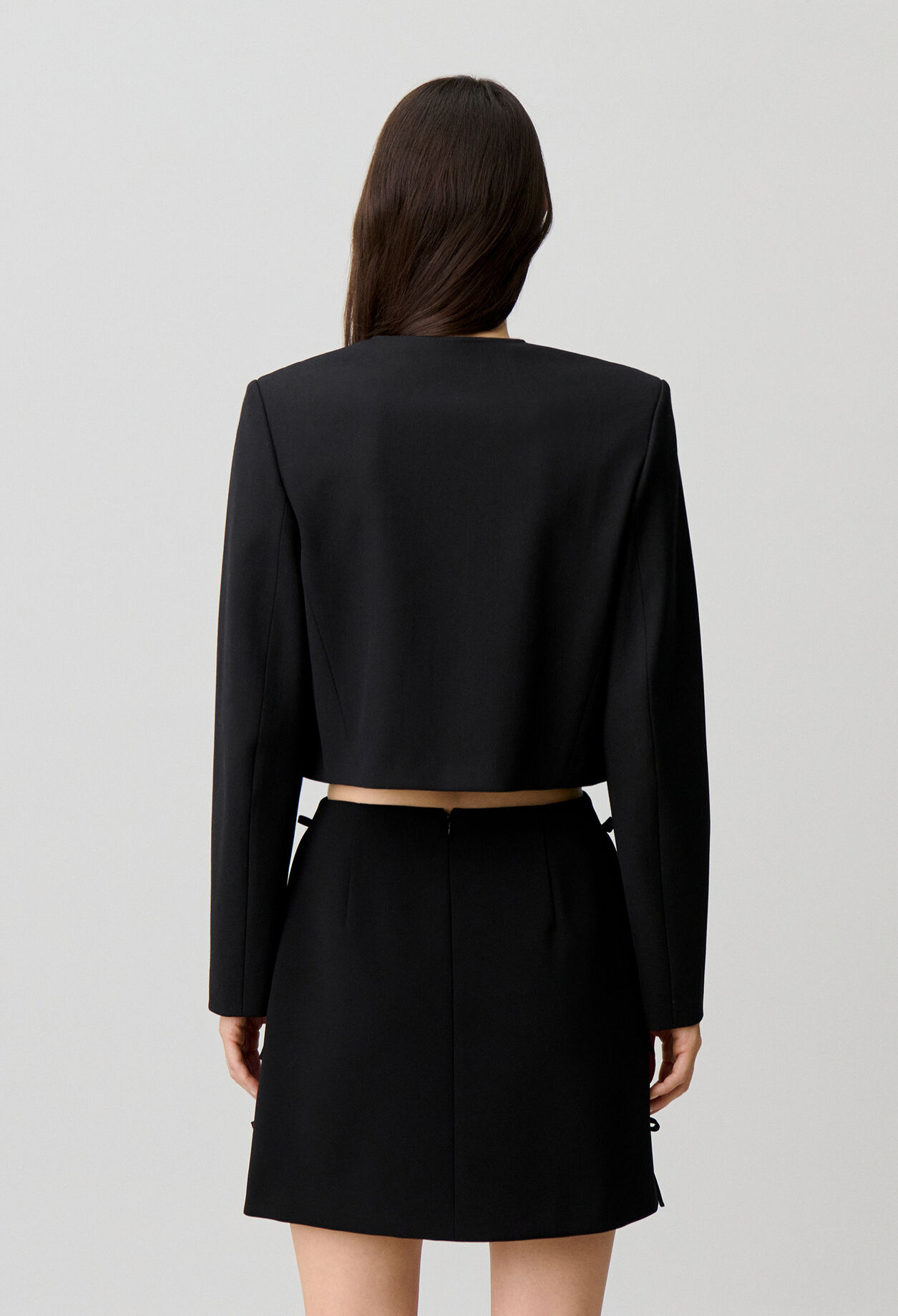 Veste courte boutons bijoux