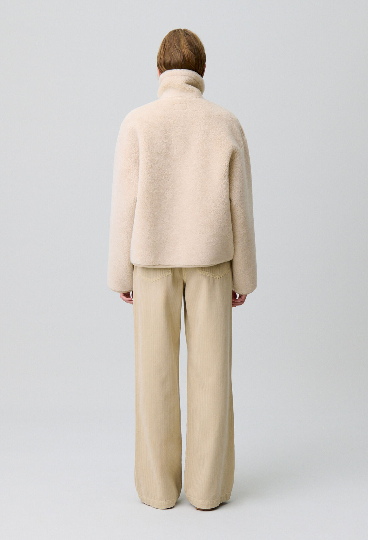 Manteau effet peau lainée
