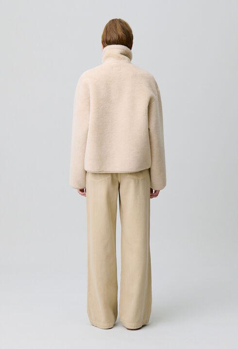 Manteau effet peau lainée