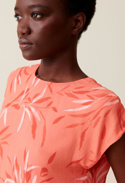 Top dos nu à motif floral