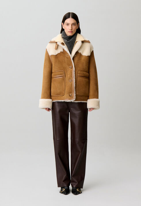 Veste peau lain&eacute;e col cuir
