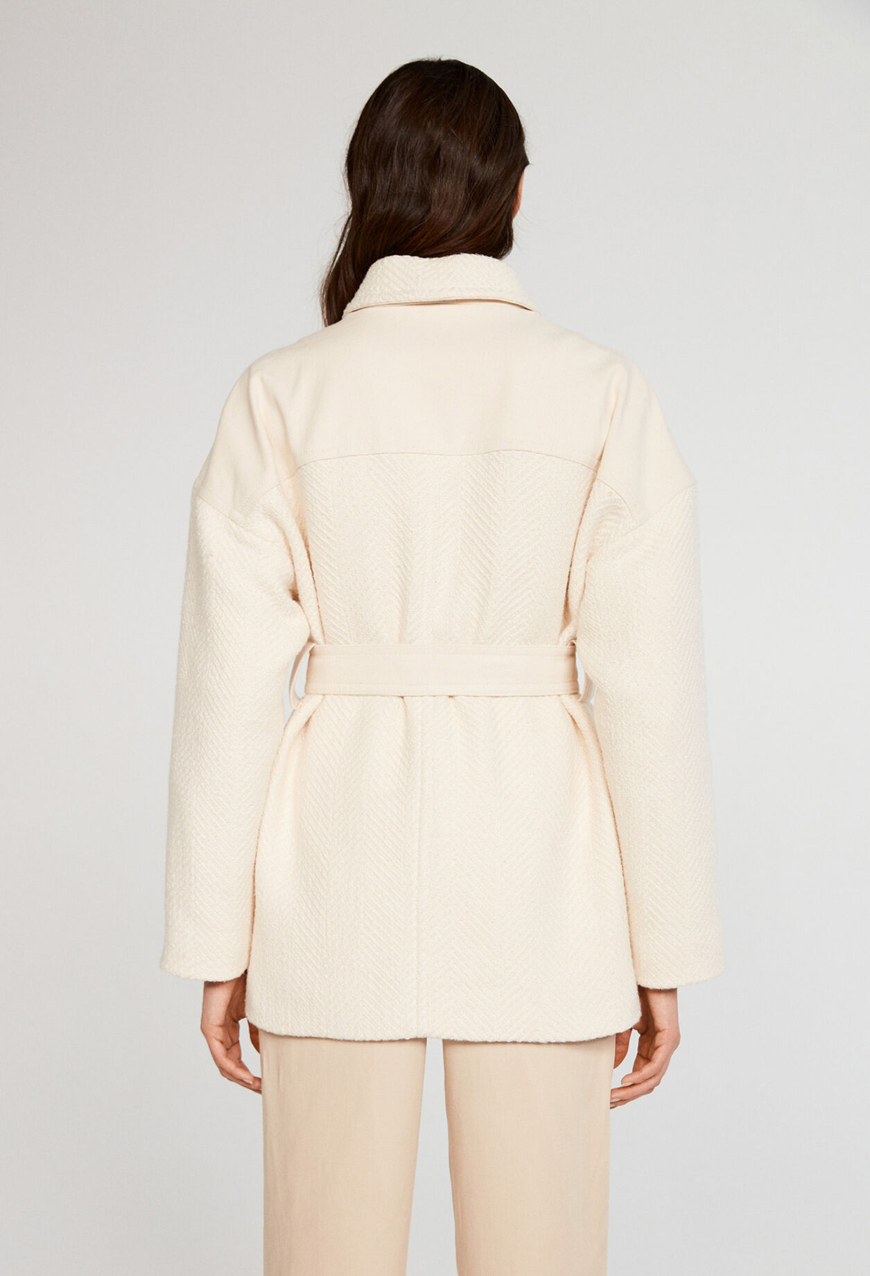 Veste en maille ceinturée