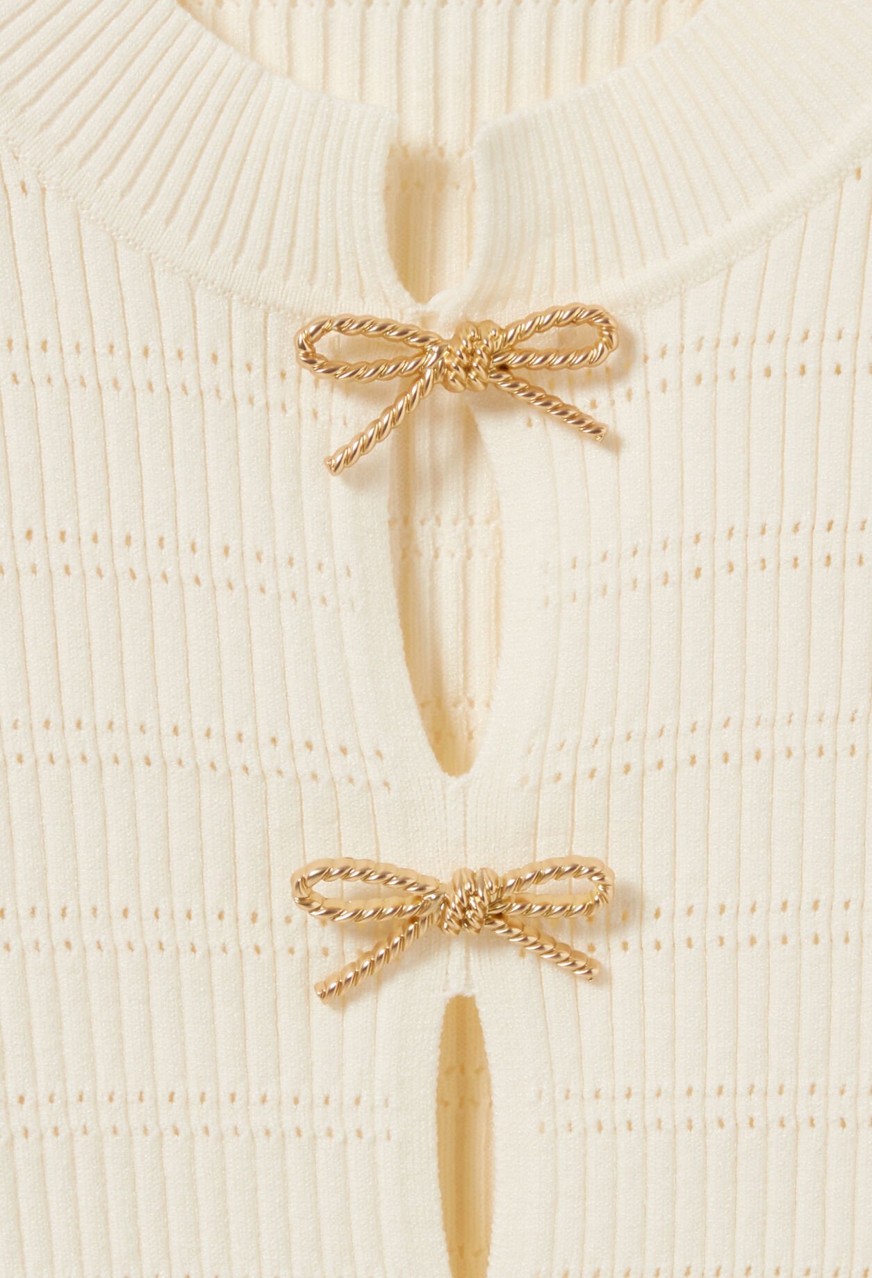 Pull maille fine noeuds