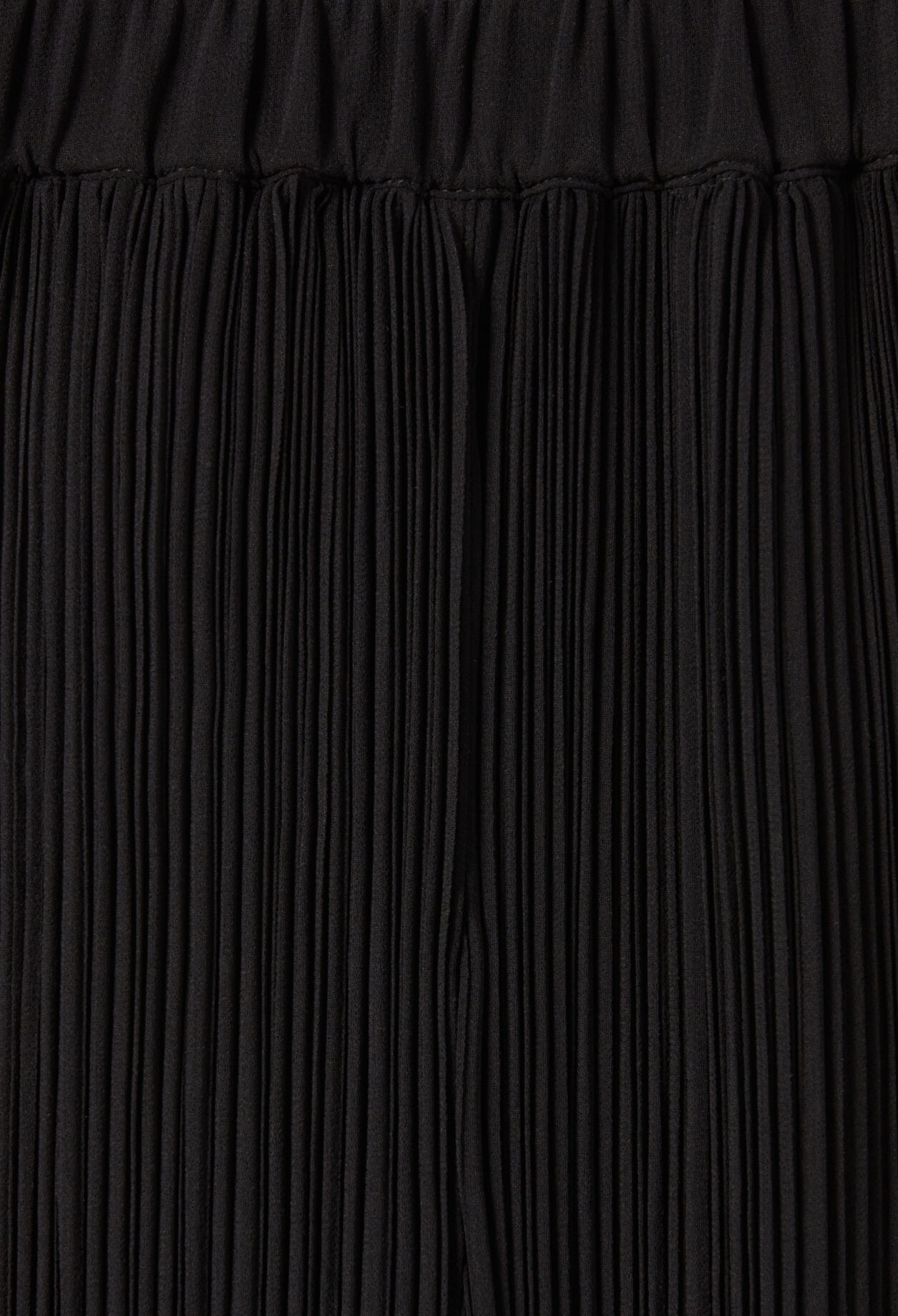 Pantalon fluide plissé volanté