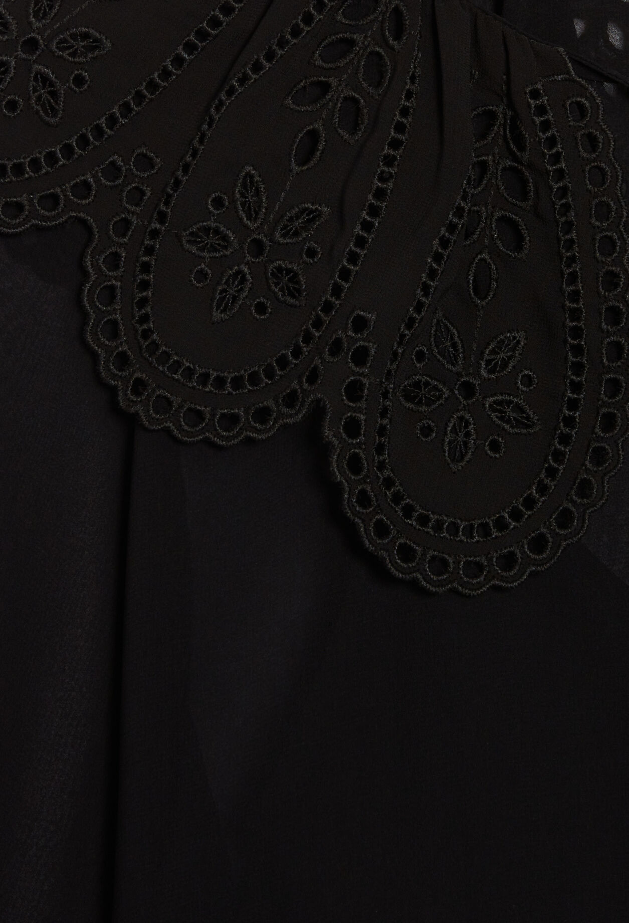 Blouse noire large col